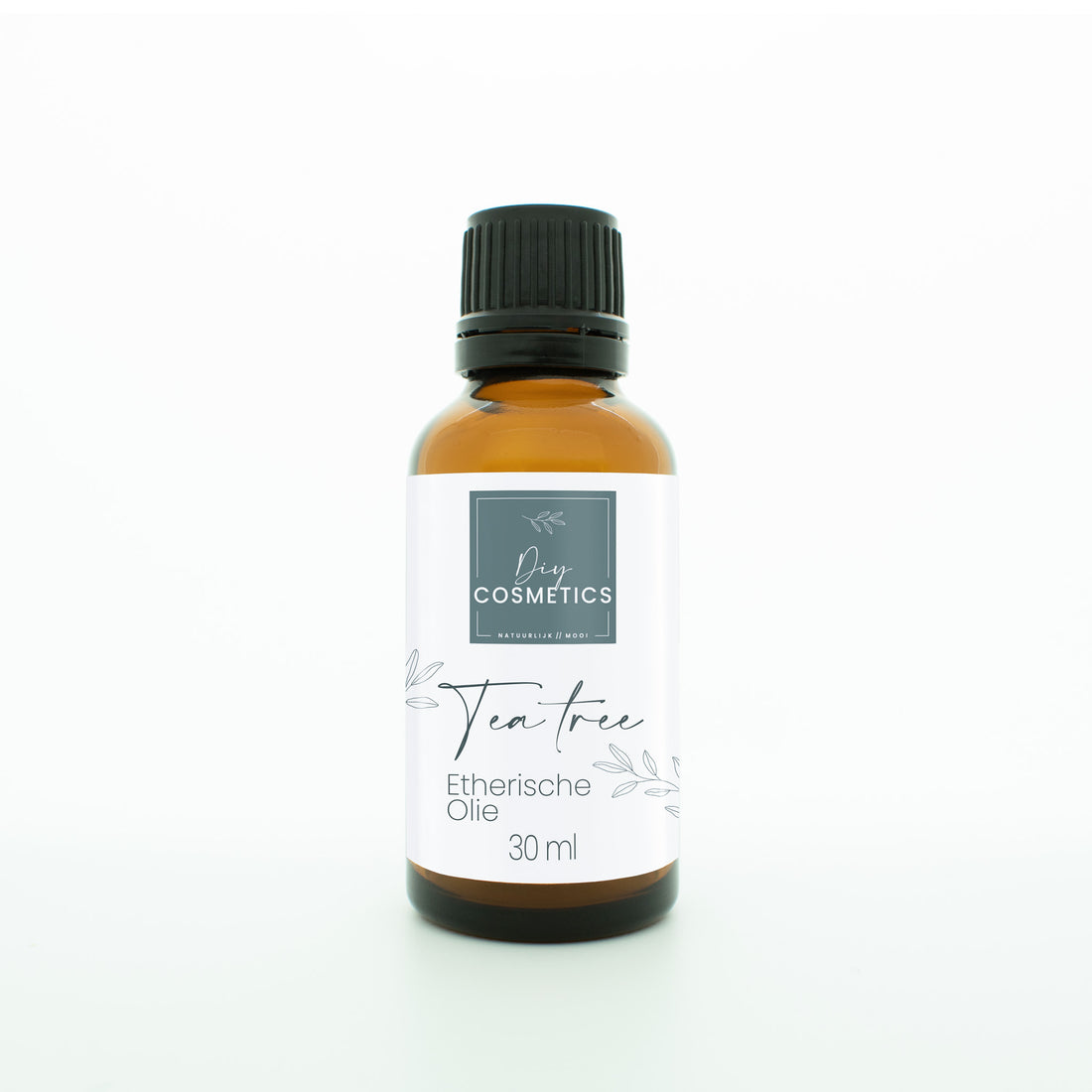 Amber kleurig glazen flesje van 30 ml met zwarte dop. Gevuld met biologische Tea tree etherische olie.